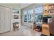 Bright home office with a view of the backyard lanai at 2595 Royal Liverpool Dr, Tarpon Springs, FL 34688