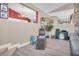 Relaxing sitting area with a comfortable recliner and decorative plants at 2595 Royal Liverpool Dr, Tarpon Springs, FL 34688