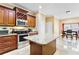 Modern kitchen with granite countertops and stainless steel appliances at 2902 Punta Palma Ct, Holiday, FL 34691