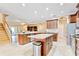 Large kitchen with granite island, breakfast bar and stainless steel appliances at 2902 Punta Palma Ct, Holiday, FL 34691