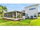 Spacious screened patio, perfect for outdoor relaxation and entertaining at 2902 Punta Palma Ct, Holiday, FL 34691