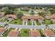 Aerial view of a villa community with a golf course nearby at 3417 Lori Ln # 2, New Port Richey, FL 34655