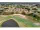 Aerial view of villas located next to a golf course at 3417 Lori Ln # 2, New Port Richey, FL 34655