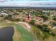 Aerial view showcasing home's location in a golf course community at 3417 Lori Ln # 2, New Port Richey, FL 34655