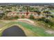 Aerial view showing a villa next to a golf course at 3417 Lori Ln # 2, New Port Richey, FL 34655