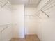 Walk-in closet with wire shelving for ample storage at 3417 Lori Ln # 2, New Port Richey, FL 34655