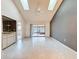 Bright dining area with tile floors,high ceilings, and access to a patio at 3417 Lori Ln # 2, New Port Richey, FL 34655