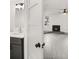 Simple bathroom with gray vanity and quartz countertop at 4712 Stonepointe Pl, Tampa, FL 33634