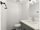 Clean bathroom with gray vanity and modern fixtures at 4712 Stonepointe Pl, Tampa, FL 33634