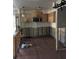 Renovation in progress, kitchen features new cabinets and microwave at 5142 Topaz Ln # 103, New Port Richey, FL 34652