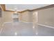 Spacious living room with tile flooring and neutral walls at 5931 Pine St, New Port Richey, FL 34652