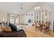 Living area with hardwood floors, open concept design, and a view to kitchen at 6604 Spring Flower Dr # 23, New Port Richey, FL 34653