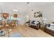 Living room with vaulted ceiling, wood floors, and comfy furniture at 6604 Spring Flower Dr # 23, New Port Richey, FL 34653