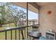 Screened balcony overlooks community pool and grounds at 6604 Spring Flower Dr # 23, New Port Richey, FL 34653