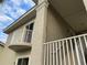Exterior view showing building stairs and a balcony at 6734 Dali Ave # 206, Land O Lakes, FL 34637