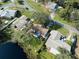 Aerial view showing home's location, yard, and surrounding neighborhood at 6920 Medlar Dr, New Port Richey, FL 34653