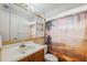 Clean bathroom with a vanity and shower/tub combo at 6920 Medlar Dr, New Port Richey, FL 34653