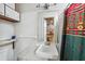 Simple bathroom includes a sink, toilet, and shower at 6920 Medlar Dr, New Port Richey, FL 34653