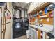 Functional laundry room, features washer, dryer, and ample storage at 6920 Medlar Dr, New Port Richey, FL 34653
