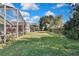 Landscaped backyard offering privacy and outdoor enjoyment at 8148 Ambersweet Pl, Land O Lakes, FL 34637