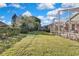 Expansive backyard with mature trees and plenty of green space at 8148 Ambersweet Pl, Land O Lakes, FL 34637