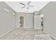 Bright bedroom with carpet, ceiling fan and access to bathroom at 8148 Ambersweet Pl, Land O Lakes, FL 34637
