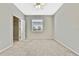Spacious bedroom with ceiling fan and window blinds at 8148 Ambersweet Pl, Land O Lakes, FL 34637