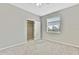 Bright bedroom with ceiling fan and closet at 8148 Ambersweet Pl, Land O Lakes, FL 34637