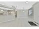 Open dining area adjacent to kitchen with tile floors at 8148 Ambersweet Pl, Land O Lakes, FL 34637