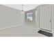 Empty dining room with tile floors and a window at 8148 Ambersweet Pl, Land O Lakes, FL 34637