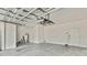 Spacious garage with high ceilings and ample storage space at 8148 Ambersweet Pl, Land O Lakes, FL 34637