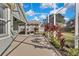Large screened patio with ceiling fan, adjacent to home at 8148 Ambersweet Pl, Land O Lakes, FL 34637