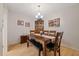 Dining room with wood table, chairs, and a china cabinet at 8350 High Point Cir # 3, Port Richey, FL 34668