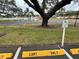 Designated golf cart parking area near lake at 8350 High Point Cir # 3, Port Richey, FL 34668