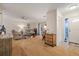 Living room with hardwood floors, comfy seating, and large windows at 8350 High Point Cir # 3, Port Richey, FL 34668