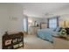 Spacious main bedroom with dresser and large bed at 8350 High Point Cir # 3, Port Richey, FL 34668