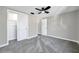 Bedroom with closet and ceiling fan at 8806 Avondale Ln, Hudson, FL 34667