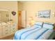 Bedroom with a double bed and dresser at 9250 Alcott Way, Trinity, FL 34655