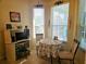 Cozy breakfast nook with a lemon-themed table setting at 9250 Alcott Way, Trinity, FL 34655