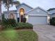 Attractive one-story home with two-car garage and landscaped yard at 9250 Alcott Way, Trinity, FL 34655