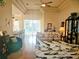 Spacious living room featuring hardwood floors and ample natural light at 9250 Alcott Way, Trinity, FL 34655