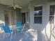 Covered patio with seating area and ceiling fan at 9250 Alcott Way, Trinity, FL 34655