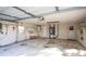 Attached garage with utility sink and ample storage at 9321 Mansard Ln, Port Richey, FL 34668