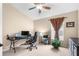 Home office with a desk, chair, and ample natural light at 9837 Riverchase Dr, New Port Richey, FL 34655