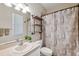 Clean bathroom with tub, shower, and updated vanity at 1005 Mizzen Ct, Tarpon Springs, FL 34689