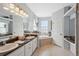 Double vanity bathroom with garden tub and separate shower at 1005 Mizzen Ct, Tarpon Springs, FL 34689
