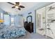 Main bedroom with private access to a relaxing patio at 1005 Mizzen Ct, Tarpon Springs, FL 34689