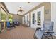 Relaxing community porch with rocking chairs at 1005 Mizzen Ct, Tarpon Springs, FL 34689