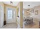 Bright entryway with a view into the dining area and features a decorative niche at 1005 Mizzen Ct, Tarpon Springs, FL 34689