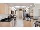Well-equipped kitchen with granite countertops and ample cabinetry at 1005 Mizzen Ct, Tarpon Springs, FL 34689